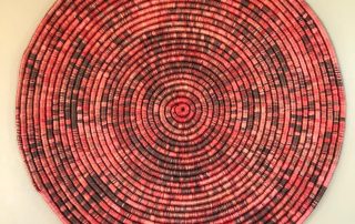 Venus y Loco, Red Spiral Rug, 2021, combed natural agave fiber, dyed with Mexican logwood, 33.75” diameter x 1”