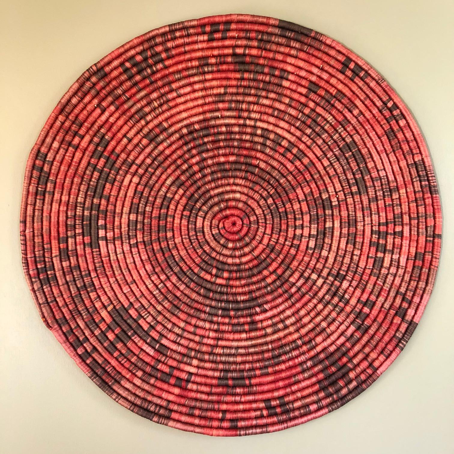 Venus y Loco, Red Spiral Rug, 2021, combed natural agave fiber, dyed with Mexican logwood, 33.75” diameter x 1”
