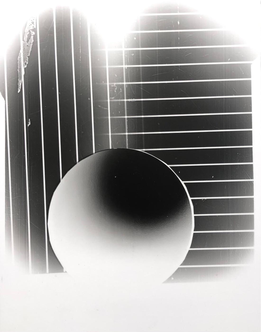 Juan Fernandez, Sphere 1 (Negative), 2022, Laminated silver gelatin print mounted on masonite 14” x 11” x 1”