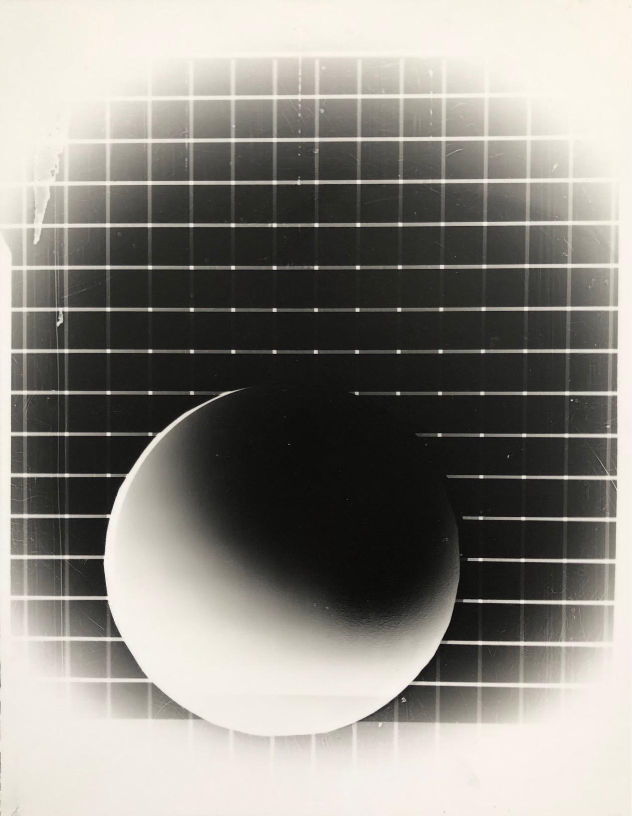 Juan Fernandez, Sphere 3 (Negative), 2022, Laminated silver gelatin print mounted on masonite, 14” x 11” x 1”