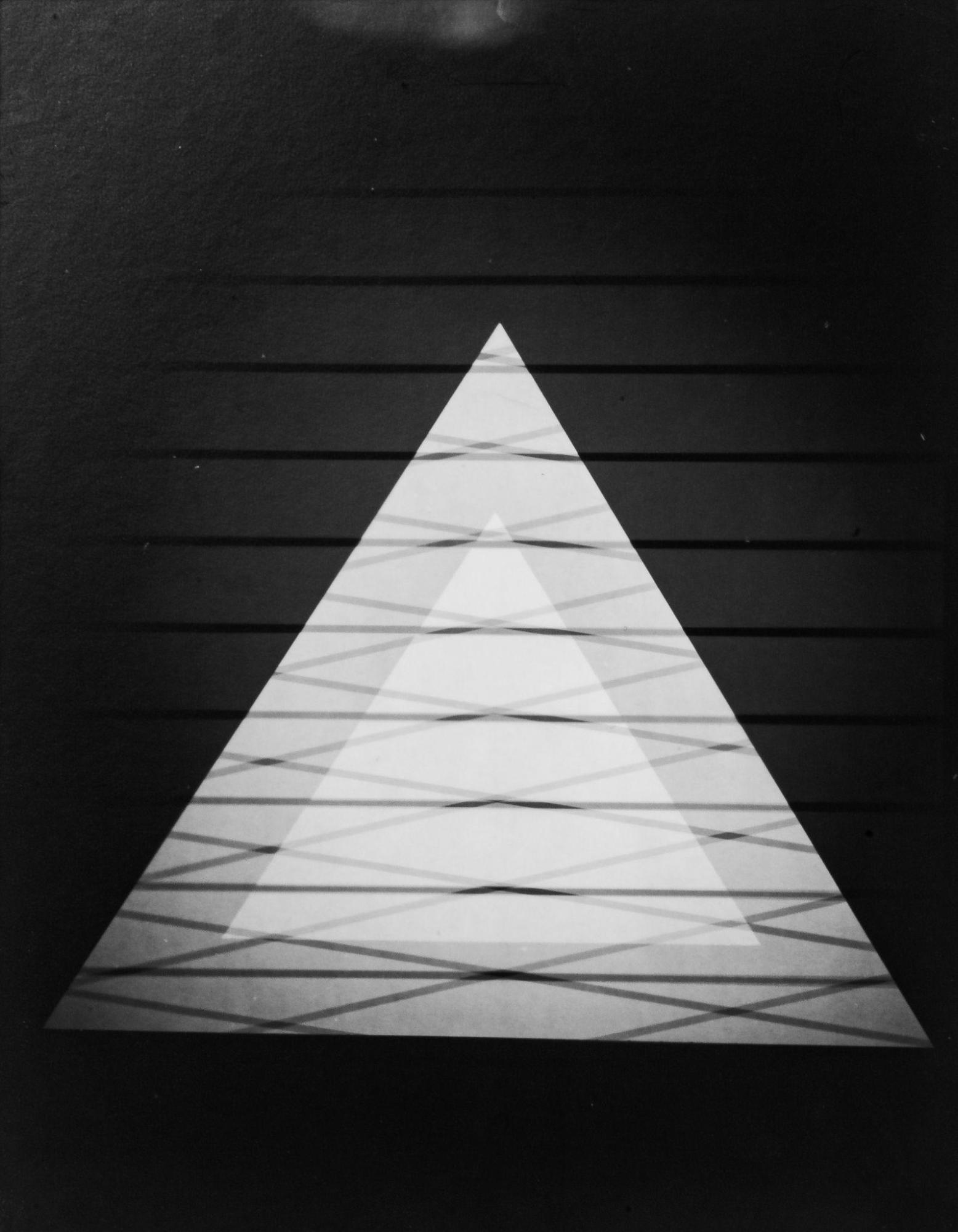 Juan Fernandez, Pyramid Scheme (Positive), 2021, Laminated silver gelatin print mounted on masonite, 14” x 11” x 1”